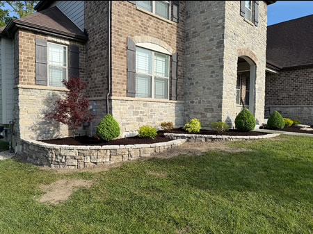 How Do Retaining Walls and Pavers Improve Function and Design?